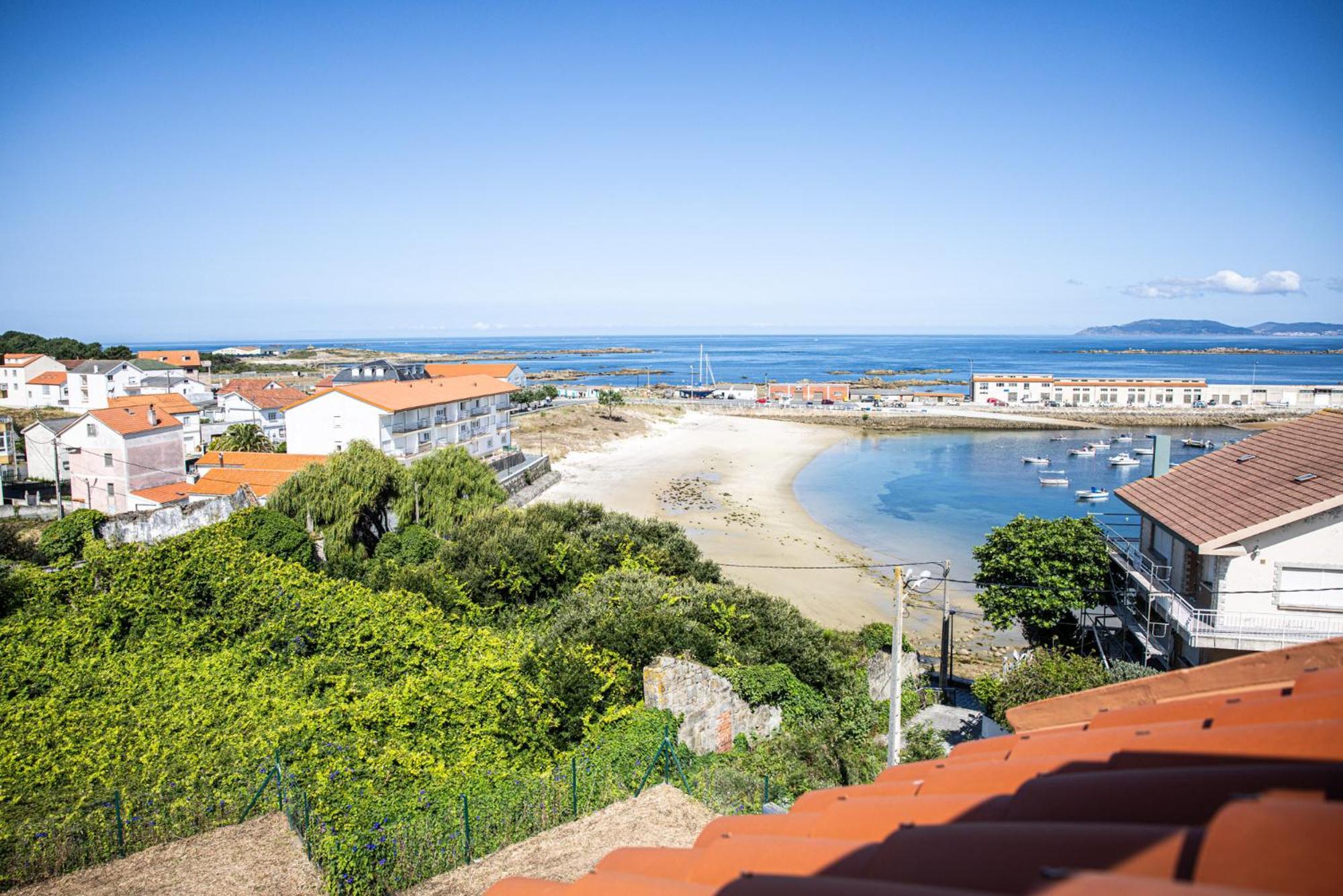 Apartamentos Portocubela Lira  Exteriör bild