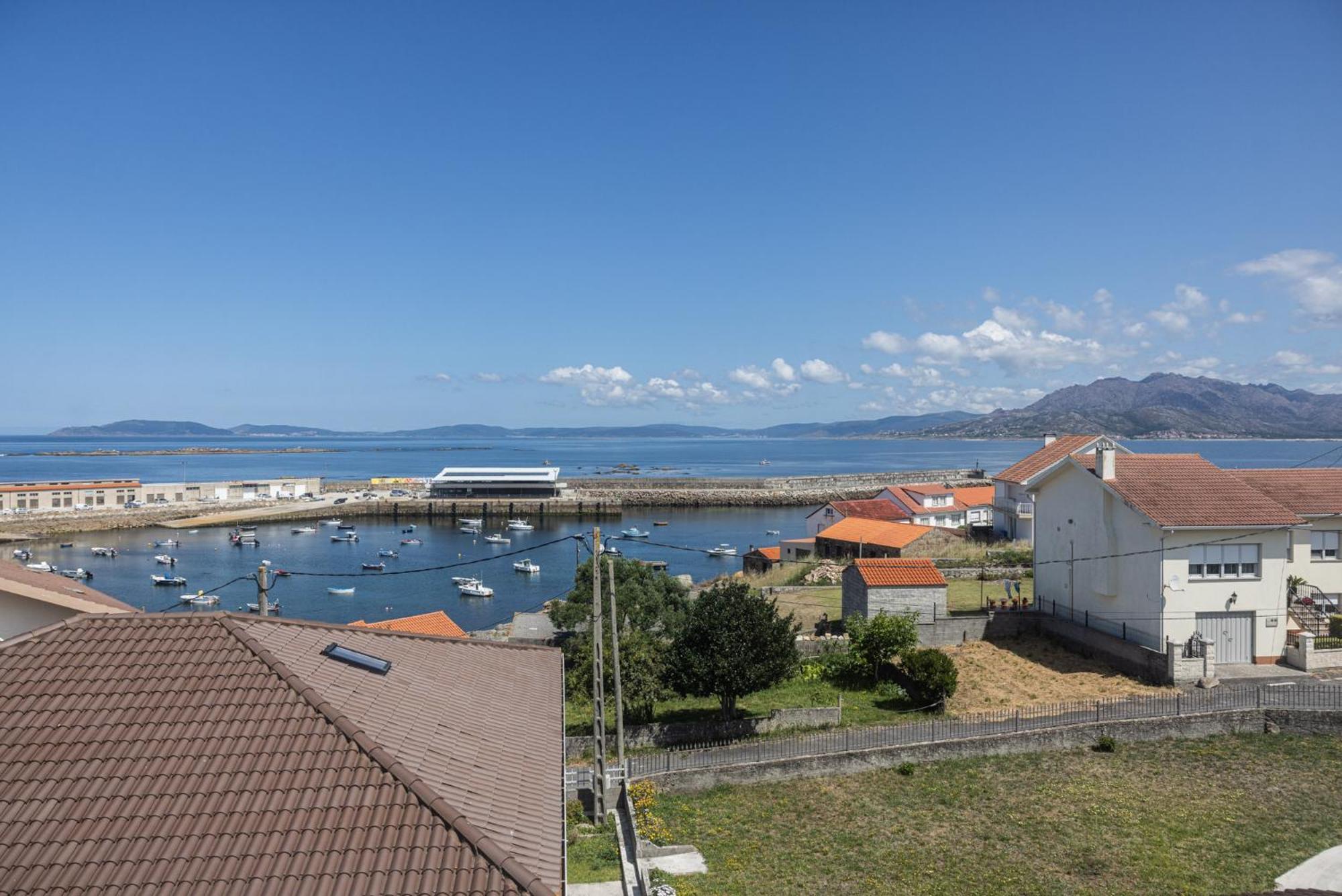 Apartamentos Portocubela Lira  Exteriör bild
